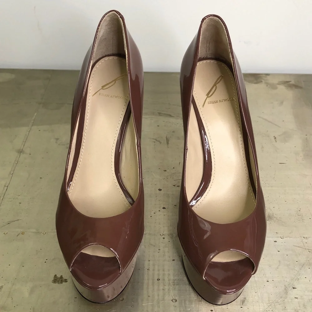 B Brian Atwood excellent nearly